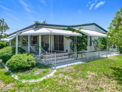 Charming 3 Bedroom, 2 Bathroom Home with 4-Carport in Brookridge on Brookridge Country Club in Florida - for sale on GolfHomes.com, golf home, golf lot