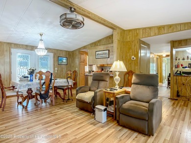 Charming 3 Bedroom, 2 Bathroom Home with 4-Carport in Brookridge on Brookridge Country Club in Florida - for sale on GolfHomes.com, golf home, golf lot