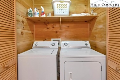 This beautifully maintained and furnished Blue Ridge Log Cabin on Beech Mountain Club in North Carolina - for sale on GolfHomes.com, golf home, golf lot