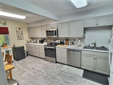 PRICE REDUCED! Huge Kitchen. Cozy, Renovated and TURN KEY LOWER on Country Club At Silver Springs Shores in Florida - for sale on GolfHomes.com, golf home, golf lot