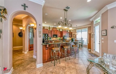 Luxury living on the fairway in the gated community of on The Golf Club At StoneBridge in Louisiana - for sale on GolfHomes.com, golf home, golf lot