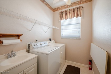 Welcome to this beautifully maintained, one-owner Osprey floor on Herons Glen Golf and Country Club in Florida - for sale on GolfHomes.com, golf home, golf lot