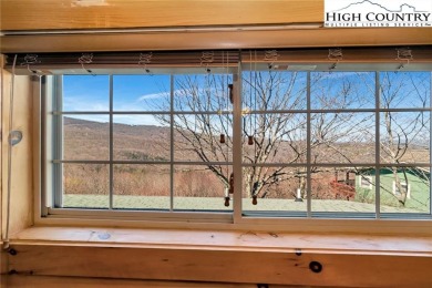 This beautifully maintained and furnished Blue Ridge Log Cabin on Beech Mountain Club in North Carolina - for sale on GolfHomes.com, golf home, golf lot