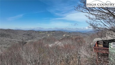This beautifully maintained and furnished Blue Ridge Log Cabin on Beech Mountain Club in North Carolina - for sale on GolfHomes.com, golf home, golf lot