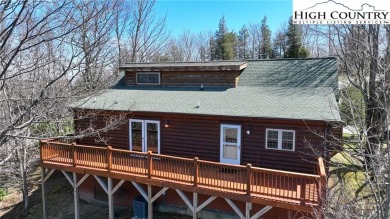 This beautifully maintained and furnished Blue Ridge Log Cabin on Beech Mountain Club in North Carolina - for sale on GolfHomes.com, golf home, golf lot