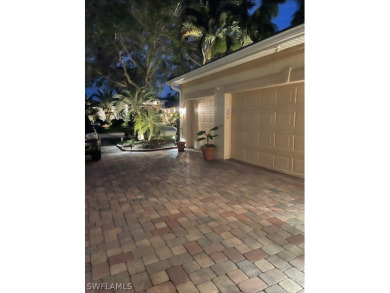 Step into the covered entry and elegant foyer, a formal dining on Estero Country Club in Florida - for sale on GolfHomes.com, golf home, golf lot