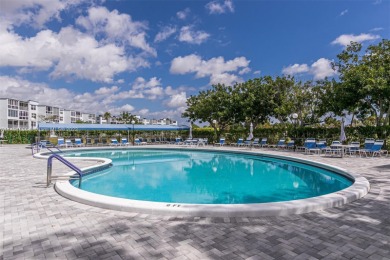 This **beautifully upgraded unit** is located in the on Oriole Golf and Tennis Club in Florida - for sale on GolfHomes.com, golf home, golf lot