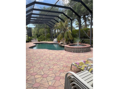 Step into the covered entry and elegant foyer, a formal dining on Estero Country Club in Florida - for sale on GolfHomes.com, golf home, golf lot