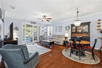 Discover refined Florida living in this solid CBS 3BR, 2BA Key on Eagle Marsh Golf Club in Florida - for sale on GolfHomes.com, golf home, golf lot