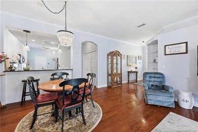 Discover refined Florida living in this solid CBS 3BR, 2BA Key on Eagle Marsh Golf Club in Florida - for sale on GolfHomes.com, golf home, golf lot