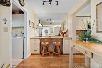 This light and bright 2nd floor condo in Bahia Vista has on Isla Del Sol Yacht and Country Club in Florida - for sale on GolfHomes.com, golf home, golf lot