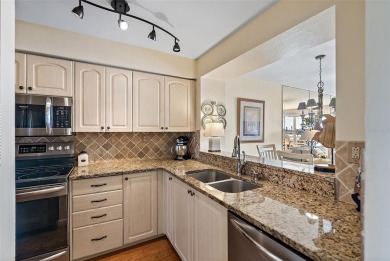 This light and bright 2nd floor condo in Bahia Vista has on Isla Del Sol Yacht and Country Club in Florida - for sale on GolfHomes.com, golf home, golf lot