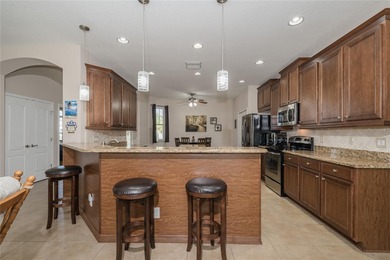 Welcome to this beautifully maintained one-owner home in the on Tampa Bay Golf and Country Club in Florida - for sale on GolfHomes.com, golf home, golf lot