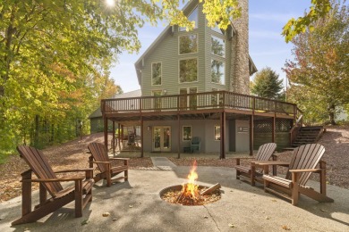 Experience year-round comfort and elegance in this meticulously on Crystal Mountain Golf Course in Michigan - for sale on GolfHomes.com, golf home, golf lot