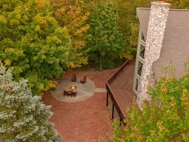 Experience year-round comfort and elegance in this meticulously on Crystal Mountain Golf Course in Michigan - for sale on GolfHomes.com, golf home, golf lot