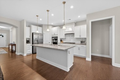 This like-new Summerwood floorplan has been lightly lived in and on Reunion Golf Club in Georgia - for sale on GolfHomes.com, golf home, golf lot