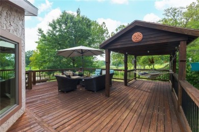 Stunning views from this beautiful home located on the 7th hole on National Golf Club of Kansas City in Missouri - for sale on GolfHomes.com, golf home, golf lot