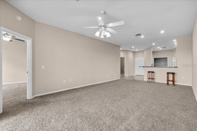 Under contract-accepting backup offers. Live the Country Club on Grasslands Golf and Country Club in Florida - for sale on GolfHomes.com, golf home, golf lot