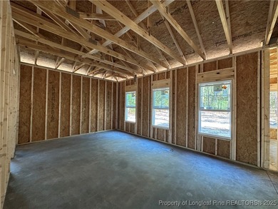 This Ranch floorplan offers spacious open floorplan living all on Deercroft Golf and Country Club in North Carolina - for sale on GolfHomes.com, golf home, golf lot