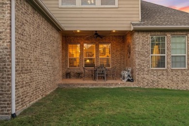 This stunning 1.5-story home with almost 3,400 sqft by American on The Lakes at Castle Hill Golf Club in Texas - for sale on GolfHomes.com, golf home, golf lot