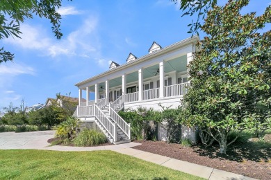 Discover this stunning custom residence in the exclusive, gated on Charleston National Golf Club in South Carolina - for sale on GolfHomes.com, golf home, golf lot