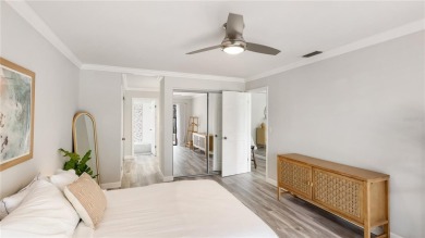 Step into a space that feels like you've left Sarasota behind on The Meadows Golf and Country Club in Florida - for sale on GolfHomes.com, golf home, golf lot