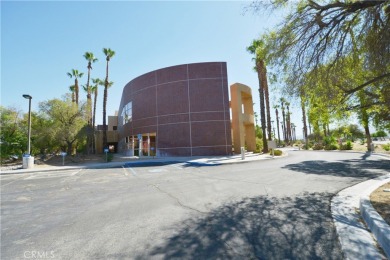 The Desert Sun Building - a stunning piece of Palm Springs on Escena Golf Club in California - for sale on GolfHomes.com, golf home, golf lot