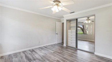 Step into a space that feels like you've left Sarasota behind on The Meadows Golf and Country Club in Florida - for sale on GolfHomes.com, golf home, golf lot