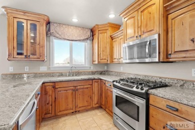 Welcome to this stunning home with exceptional curb appeal on Sage Lakes Municipal Golf Course in Idaho - for sale on GolfHomes.com, golf home, golf lot