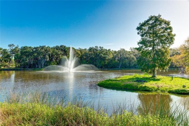 Step into a space that feels like you've left Sarasota behind on The Meadows Golf and Country Club in Florida - for sale on GolfHomes.com, golf home, golf lot