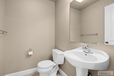 Welcome to this stunning home with exceptional curb appeal on Sage Lakes Municipal Golf Course in Idaho - for sale on GolfHomes.com, golf home, golf lot