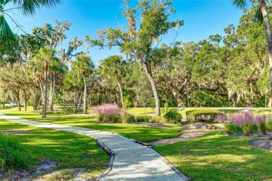 Step into a space that feels like you've left Sarasota behind on The Meadows Golf and Country Club in Florida - for sale on GolfHomes.com, golf home, golf lot