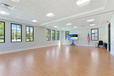 Step into a space that feels like you've left Sarasota behind on The Meadows Golf and Country Club in Florida - for sale on GolfHomes.com, golf home, golf lot