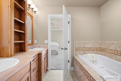 Welcome to this stunning home with exceptional curb appeal on Sage Lakes Municipal Golf Course in Idaho - for sale on GolfHomes.com, golf home, golf lot