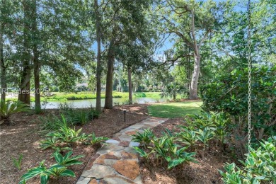 SIMPLY STUNNING - Experience Lowcountry living at its finest in on Long Cove Club in South Carolina - for sale on GolfHomes.com, golf home, golf lot