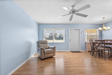 Discover the ultimate 55+ retreat in this stunning 2nd-floor on The American Golf Club in Florida - for sale on GolfHomes.com, golf home, golf lot