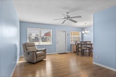 Discover the ultimate 55+ retreat in this stunning 2nd-floor on The American Golf Club in Florida - for sale on GolfHomes.com, golf home, golf lot