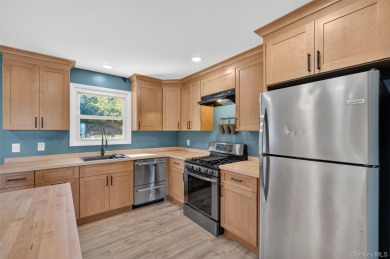 Welcome to this move in ready, beautiful, and  completely on Mc Cann Memorial Golf Course in New York - for sale on GolfHomes.com, golf home, golf lot