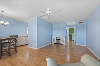 Discover the ultimate 55+ retreat in this stunning 2nd-floor on The American Golf Club in Florida - for sale on GolfHomes.com, golf home, golf lot