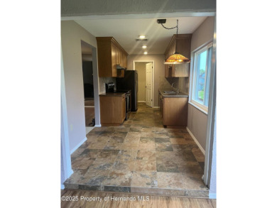 Looking for an UPDATED, move-in ready condo? Look no further on Heather Golf and Country Club in Florida - for sale on GolfHomes.com, golf home, golf lot