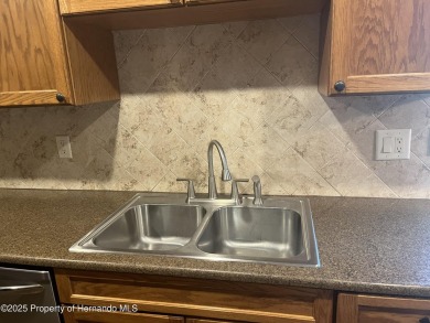 Looking for an UPDATED, move-in ready condo? Look no further on Heather Golf and Country Club in Florida - for sale on GolfHomes.com, golf home, golf lot