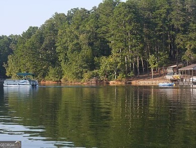 Lot 954 boasts an enviable location, overlooking the 11th green on The Trail At Chickasaw Pointe in South Carolina - for sale on GolfHomes.com, golf home, golf lot