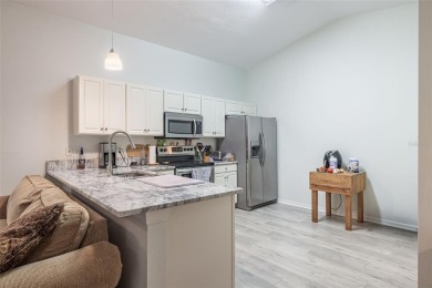 UPDATED, MOVE-IN-READY, MAINTENANCE-FREE VILLA ON A PRIVATE on Tampa Bay Golf and Country Club in Florida - for sale on GolfHomes.com, golf home, golf lot