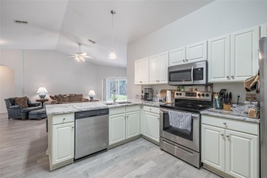 UPDATED, MOVE-IN-READY, MAINTENANCE-FREE VILLA ON A PRIVATE on Tampa Bay Golf and Country Club in Florida - for sale on GolfHomes.com, golf home, golf lot