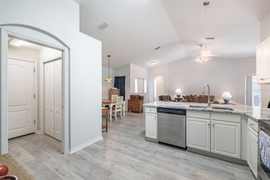 UPDATED, MOVE-IN-READY, MAINTENANCE-FREE VILLA ON A PRIVATE on Tampa Bay Golf and Country Club in Florida - for sale on GolfHomes.com, golf home, golf lot