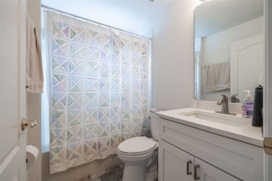 UPDATED, MOVE-IN-READY, MAINTENANCE-FREE VILLA ON A PRIVATE on Tampa Bay Golf and Country Club in Florida - for sale on GolfHomes.com, golf home, golf lot