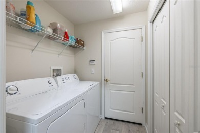 UPDATED, MOVE-IN-READY, MAINTENANCE-FREE VILLA ON A PRIVATE on Tampa Bay Golf and Country Club in Florida - for sale on GolfHomes.com, golf home, golf lot