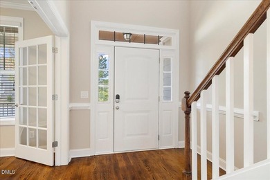 Welcome to 128 Heathgreen Drive, a beautifully maintained home on The Neuse Golf Club in North Carolina - for sale on GolfHomes.com, golf home, golf lot