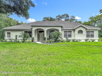 Fall in love with this picturesque Golf Course View heated pool on Citrus Hills Golf Club in Florida - for sale on GolfHomes.com, golf home, golf lot
