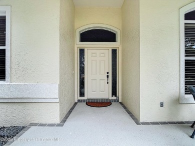 Fall in love with this picturesque Golf Course View heated pool on Citrus Hills Golf Club in Florida - for sale on GolfHomes.com, golf home, golf lot